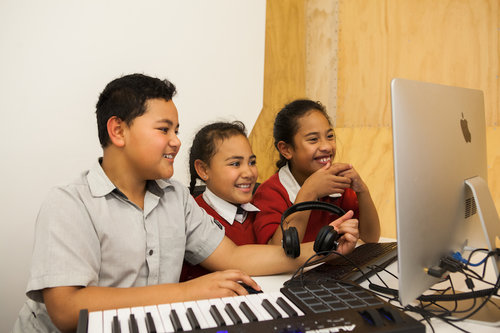 Job Find Assistance Programme - Children in music room with computer